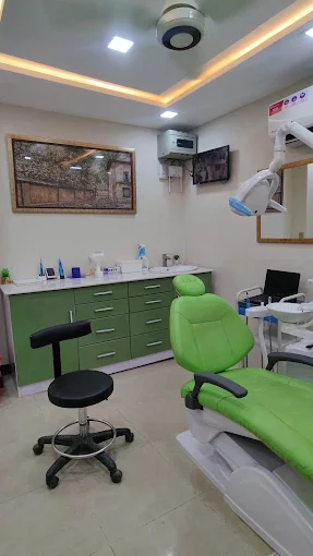 Treatment room with dental chair at Dr. Talha Dental Clinic